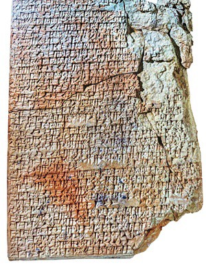 A photo of a Mesopotamian stone tablet, with recipes written in ancient text. 09828-newscripts-tablet.jpg