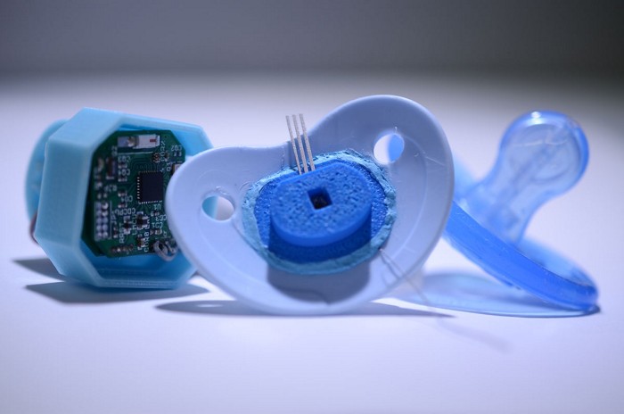 Engineered pacifier measures glucose in saliva